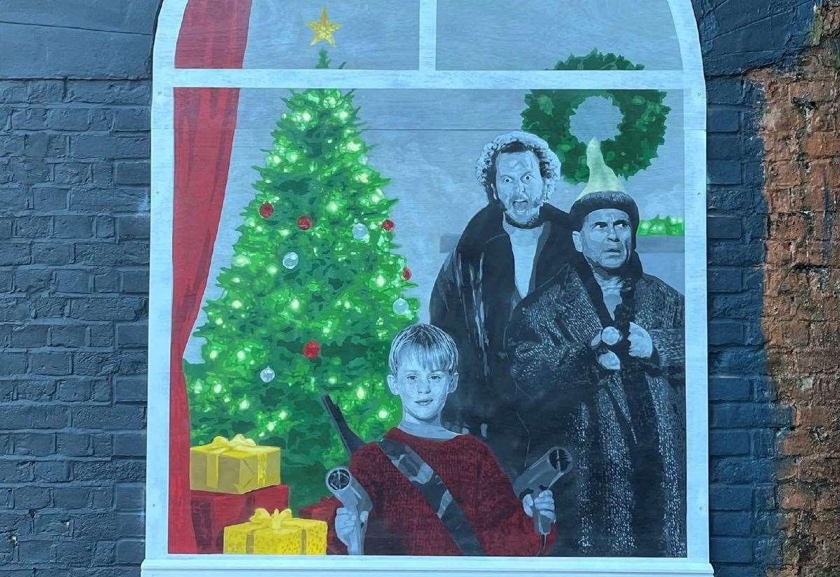 Street artist Catman paints Home Alone stars Kevin, Harry and Marv on Whitstable bridge for Christmas