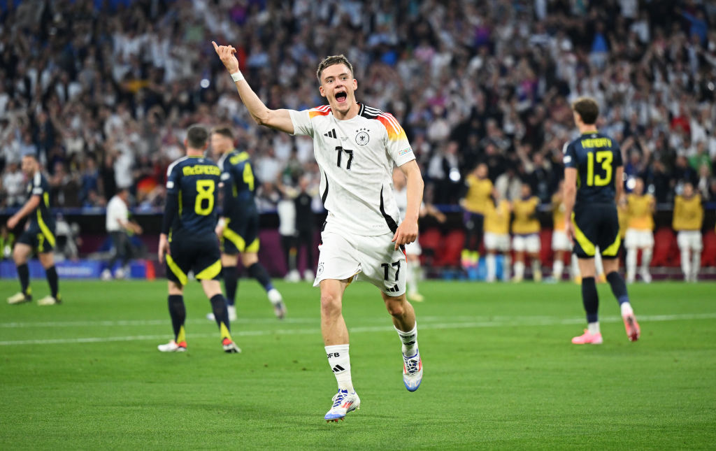 Germany Euro 2024 squad Florian Wirtz of Germany celebrates scoring his team's first goal during the UEFA EURO 2024 group stage match between Germany and Scotland at Munich Football Arena on June 14, 2024 in Munich, Germany. (Photo by Shaun Botterill/Getty Images)