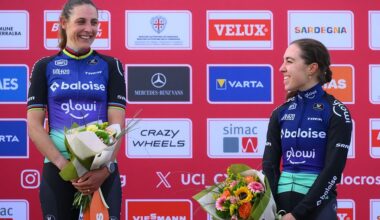 Dutch Lucinda Brand and Dutch Shirin van Anrooij pictured on the podium after the women's elite race of the Cyclocross World Cup, in Terralba, Sardinia, Italy, Sunday 07 December 2025, stage 3 (out of 12) in the World Cup of the 2026-2027 season. BELGA PHOTO DAVID PINTENS (Photo by DAVID PINTENS / BELGA MAG / Belga via AFP)