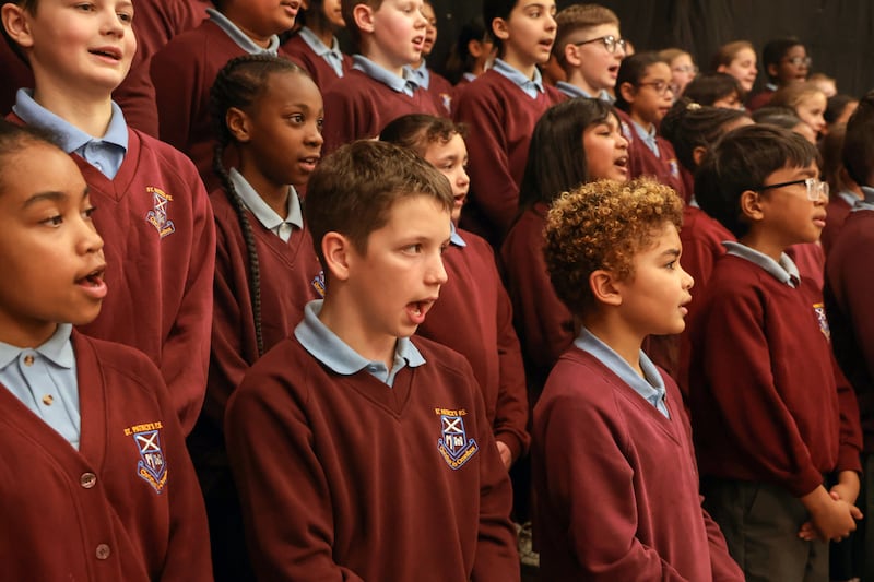 Pupils at St Patrick’s Primary School, one of the North’s most diverse primary schools, sing with the choir led by Malachi Cush. PICTURE: BRIAN LINCOLN