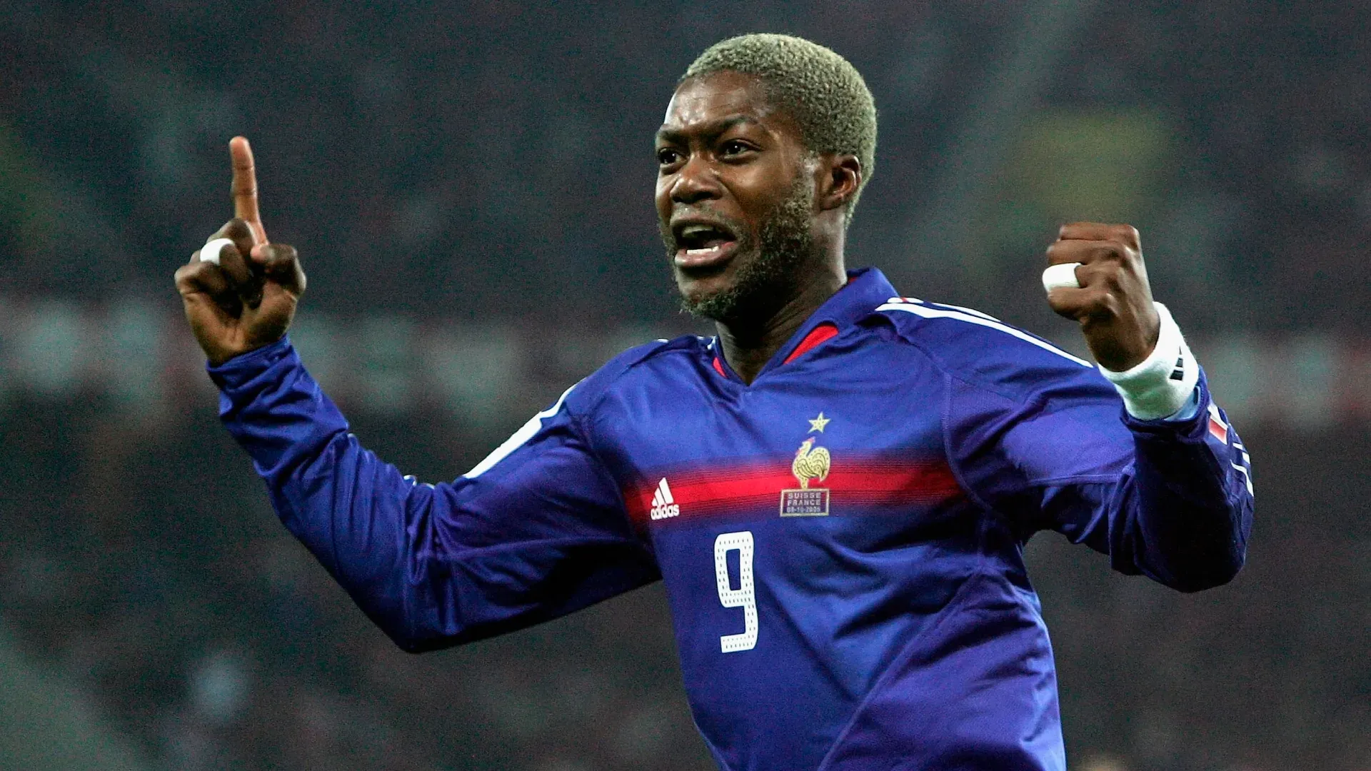 Djibril Cisse of France celebrating.