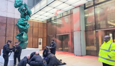 The scene at Aspen Insurance at Plantation Place in the City of London, after two activists sprayed red paint over the front of the building, in support of the Palestine Action protesters on hunger strike in prison, Tuesday, Dec. 23, 2025.