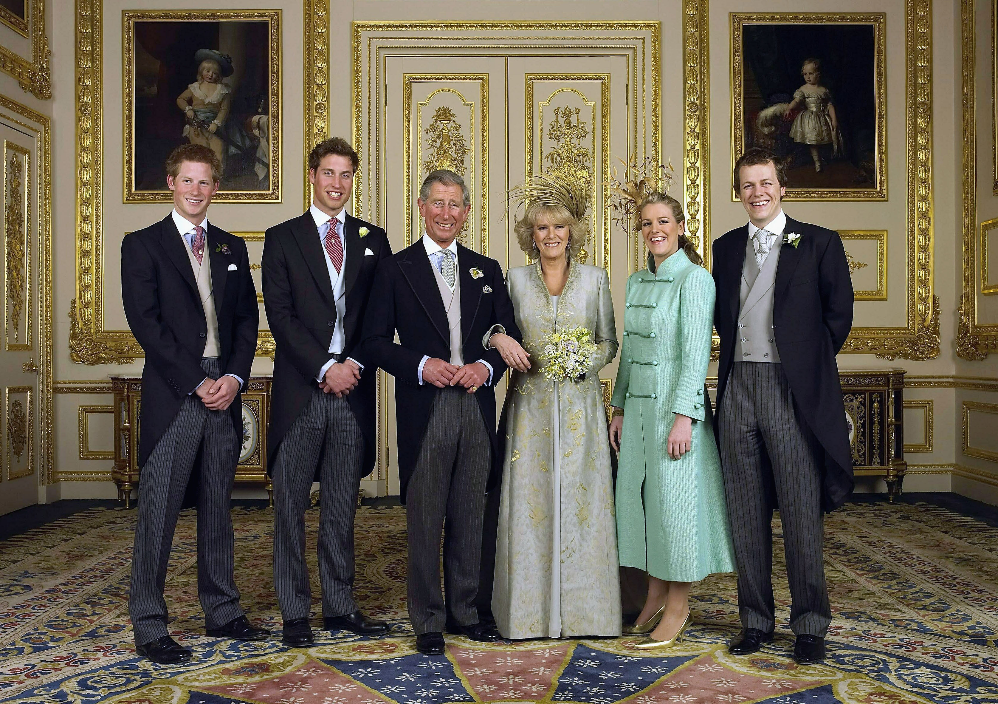 WINDSOR, ENGLAND - APRIL 9: (EMBARGOED TILL 0001 BST MONDAY 11 APRIL 2005) TRH Prince Charles and The Duchess Of Cornwall, Camilla Parker Bowles pose with their children (L-R) Prince Harry, Prince William, Laura and Tom Parker Bowles, in the white drawing room for the Official Wedding group photo following their earlier marriage at The Guildhall, at Windsor Castle on April 9, 2005 in Berkshire, England. (Photo by Hugo Bernand/ROTA/Anwar Hussein Collection/Getty Images) *** Local Caption *** HRH Prince Charles;HRH The Duchess Of Cornwall;Prince William;Prince Harry