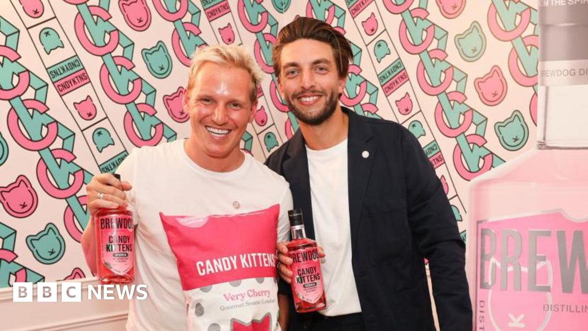 Candy Kittens co-founders Jamie Laing and Edward Williams pose with the company's products