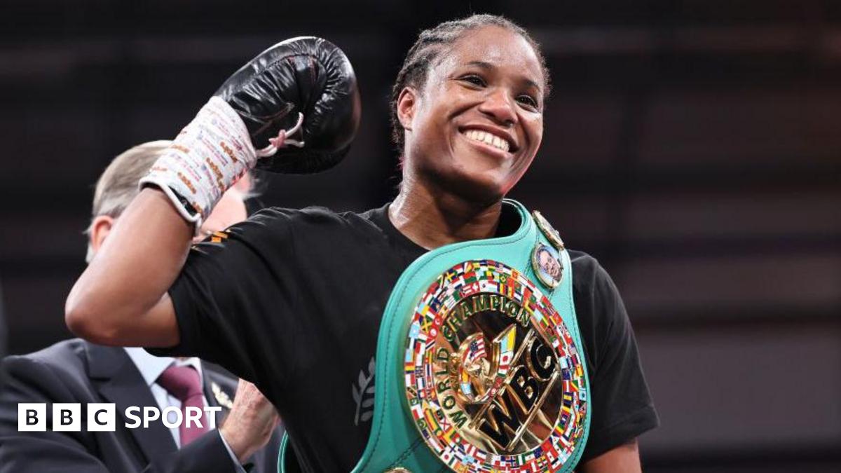 Caroline Dubois smiles with her WBC title around her shoulder