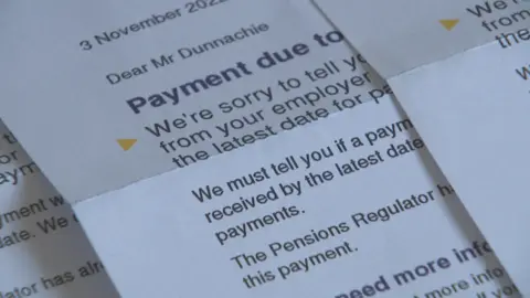 A close-up of a letter showing printed text about pension payments. The visible text includes phrases like ‘Payment due to…’, ‘We’re sorry to tell you…’, and ‘The Pensions Regulator.’ The letter is dated 3 November.