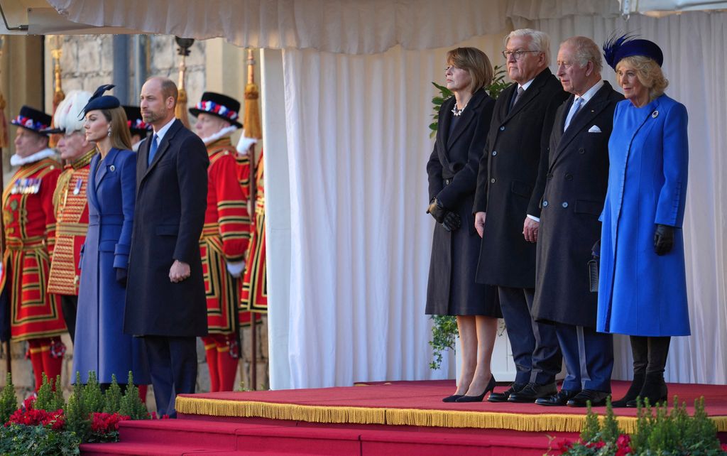 The royals and the Presidential couples stood for the national anthems 
