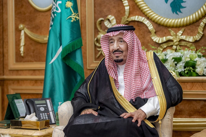 This handout picture released by the Saudi Royal Palace shows Saudi Arabias King Salman bin Abdulaziz al-Saud attending his son the crown princes oath-taking ceremony to appointing the latter as the countrys new prime minister, at al-Salam Royal Palace in the Red Sea coastal city of Jeddah on Sep. 27, 2022. Photo by Saudi Royal Palace via AFP