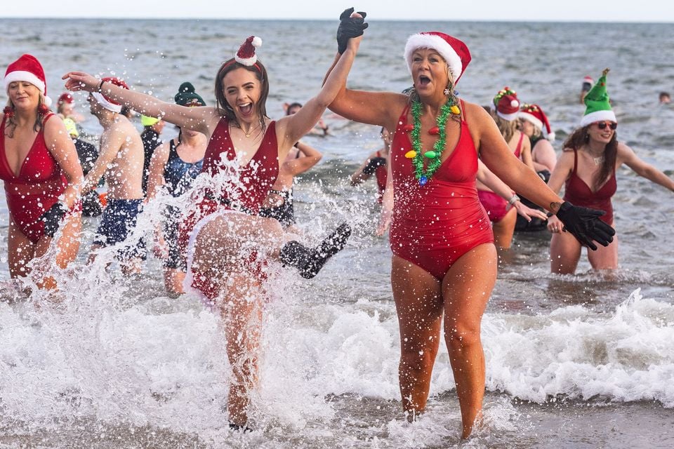 The Christmas Eve dip at Helen’s Bay. Photo: Luke Jervis/Belfast Telegraph