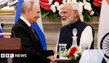 Russian President Vladimir Putin and India's Prime Minister Narendra Modi shake hands as they attend a presentation of a joint statement after their delegation level talks at Hyderabad House in New Delhi/