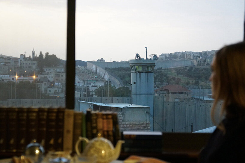 banksy's 'walled off hotel' reopens in bethlehem after two-year closure
