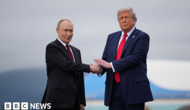 US President Donald Trump (right) shakes hands with Russian President Vladimir Putin (left) as they meet at Joint Base Elmendorf-Richardson on 16 August 2025 in Anchorage, Alaska.