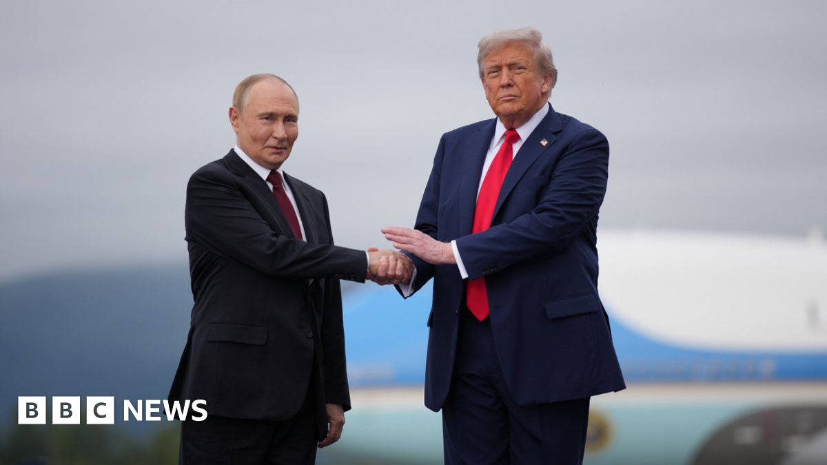US President Donald Trump (right) shakes hands with Russian President Vladimir Putin (left) as they meet at Joint Base Elmendorf-Richardson on 16 August 2025 in Anchorage, Alaska.