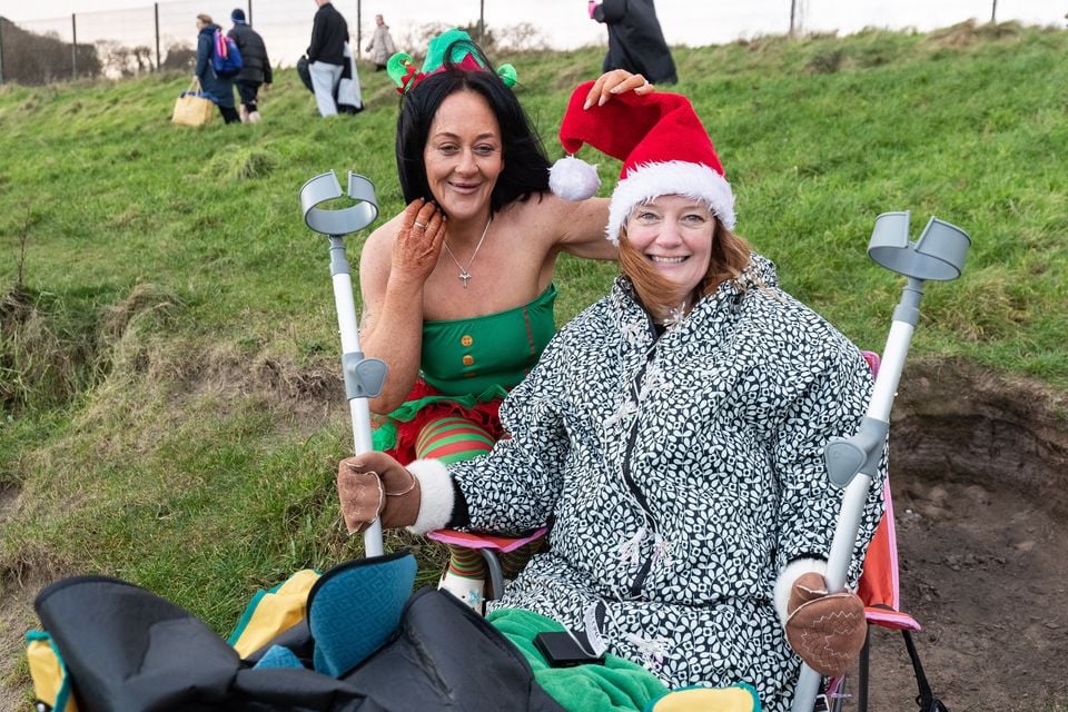 Katherine Lynn and Louise Jackson at the Christmas Eve dip at Helen’s Bay on 24th December 2025 (Luke Jervis/Belfast Telegraph)