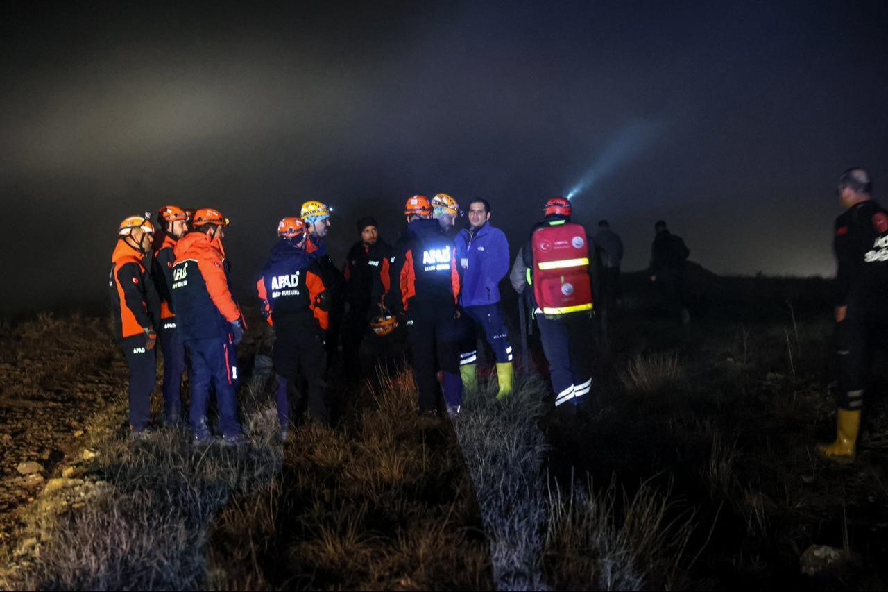 Rescuers work as search and rescue operations are ongoing at the wreckage site following the crash of a Libya-bound business jet in Ankara, Dec. 23, 2025. (AFP Photo)