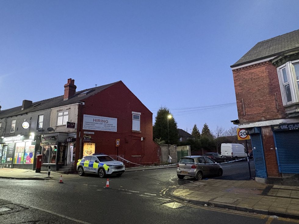 Crime scene tape at the scene at Wilfrid Road, Darnall, Sheffield