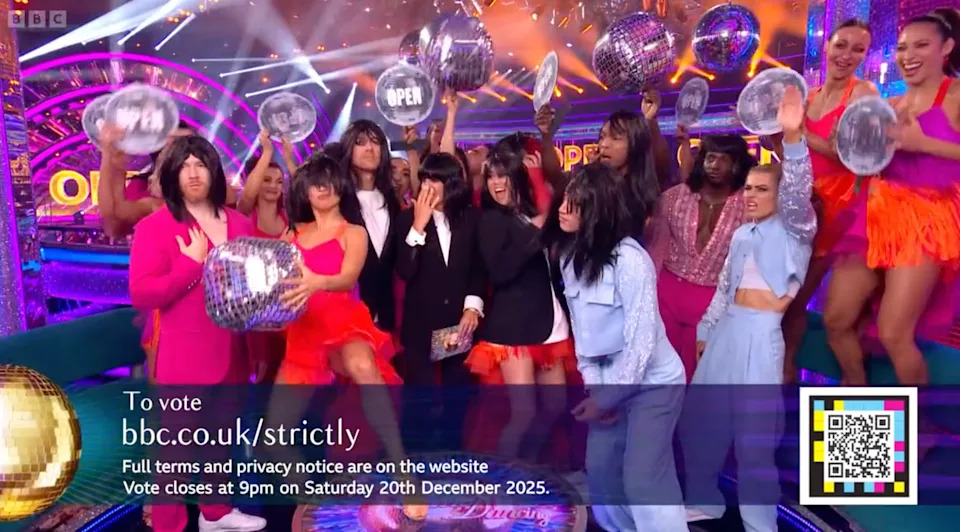 The Strictly cast surprised Claudia Winkleman with matching wigs. (BBC screengrab)