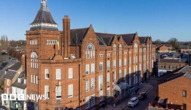 A red-brick Victorian-style large former factory