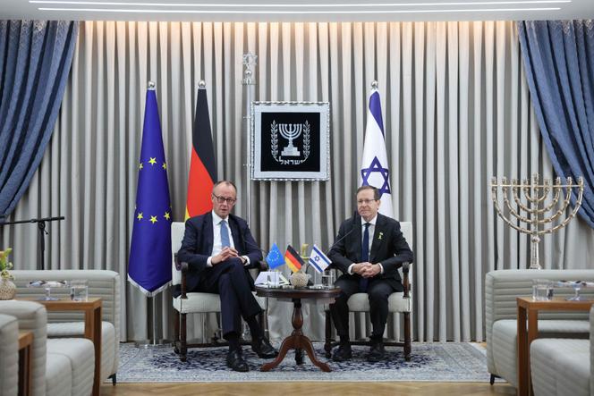 German Chancellor Friedrich Merz (L) meets with Israel's President Isaac Herzog at the president's residence in Jerusalem, December 6, 2025. 