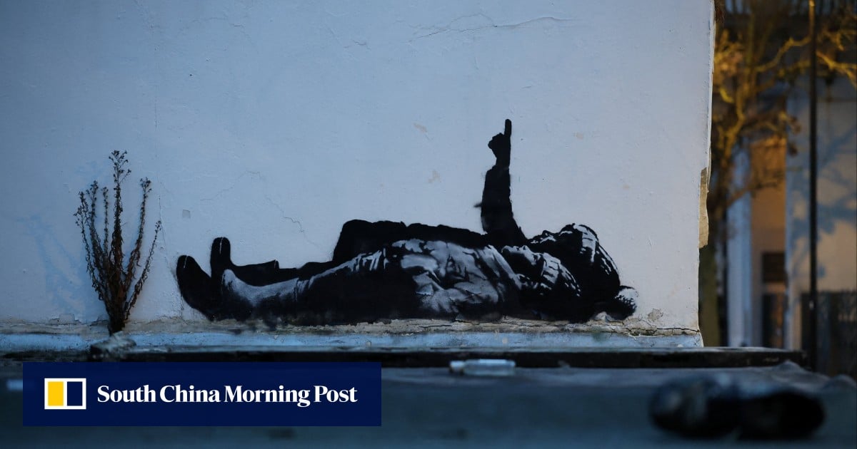 UK street artist Banksy unveils latest mural in central London