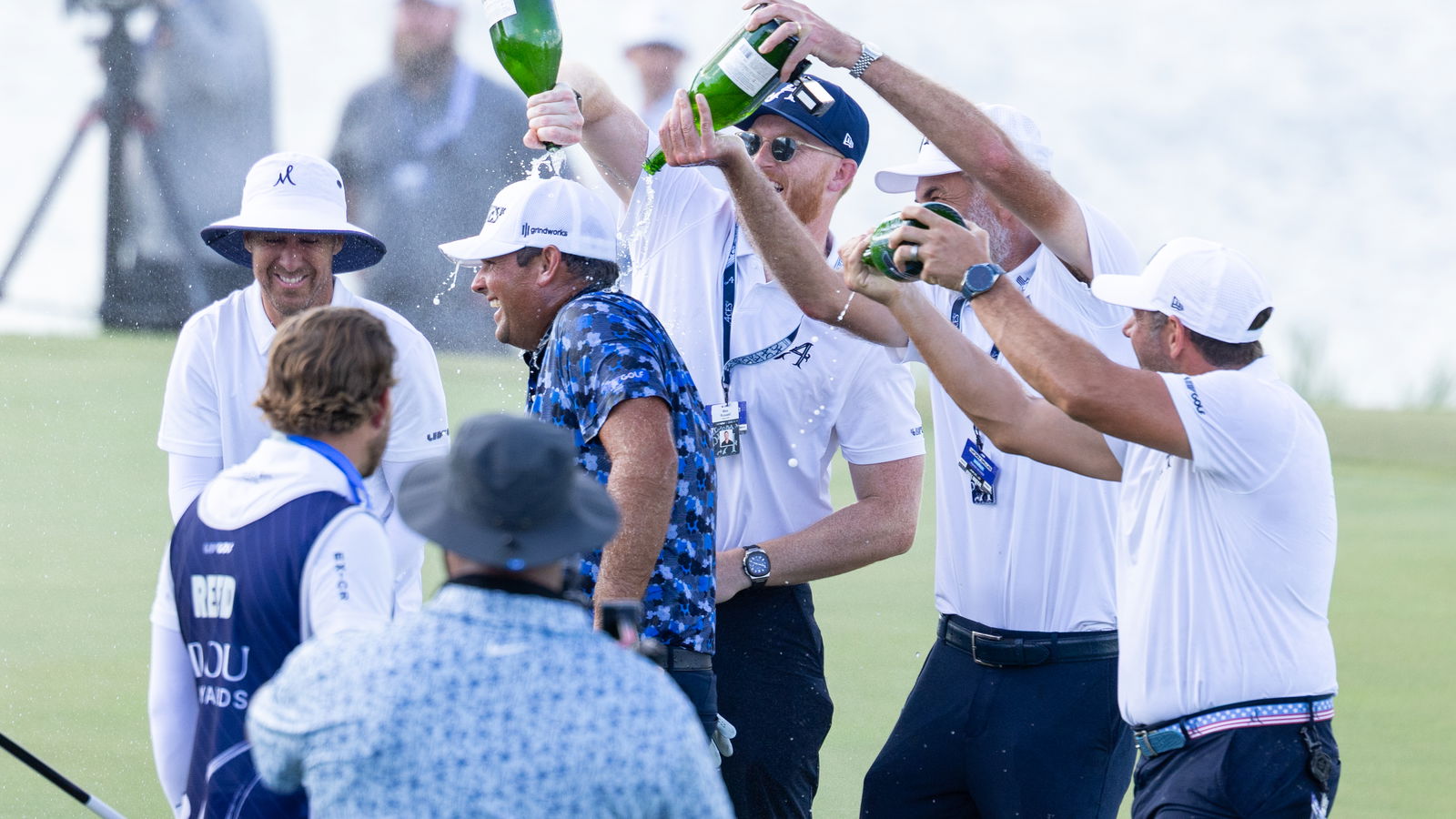 LIV Golf's Patrick Reed is doused in champagne