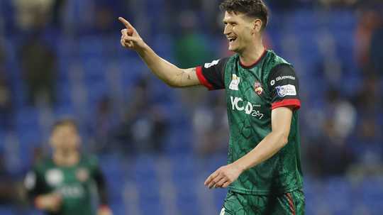 david-payne-celebrates-one-of-his-three-wickets-in-the-19th-over-of-the-game