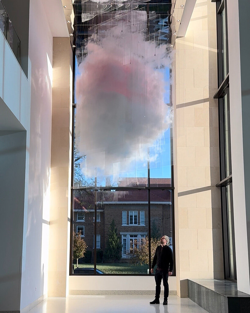 artist david spriggs suspends 'astra' installation as an ephemeral cloud of transparent planes