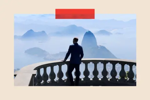 Getty Images Prince William looks out towards Sugar Loaf Mountain on a balcony