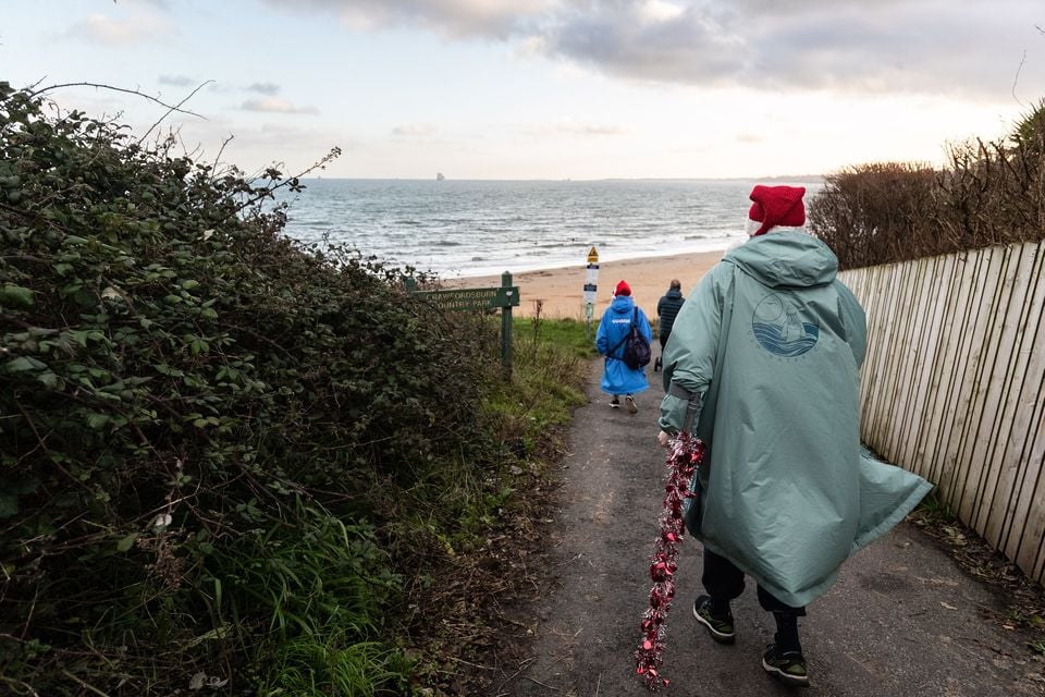 Christmas Eve dip at Helen’s Bay on 24th December 2025 (Luke Jervis/Belfast Telegraph)