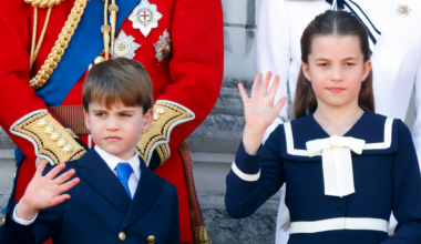 Princess Charlotte and Prince Louis waving on the balcony during Trooping the Colour 2024