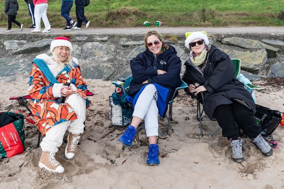 Alanna, Patricia and Karen at the Christmas Eve dip at Helen’s Bay on 24th December 2025 (Luke Jervis/Belfast Telegraph)