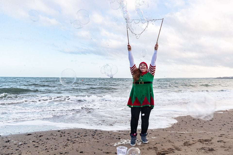 Christmas Eve dip at Helen’s Bay on 24th December 2025 (Luke Jervis/Belfast Telegraph)
