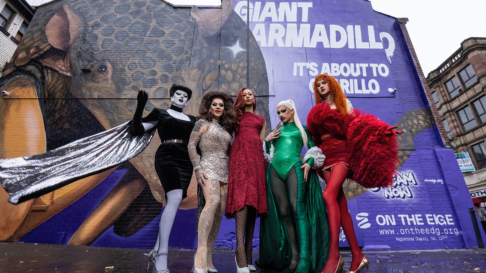 Giant armadillo and host of drag queens launch Christmas charity single with Manchester mural stunt