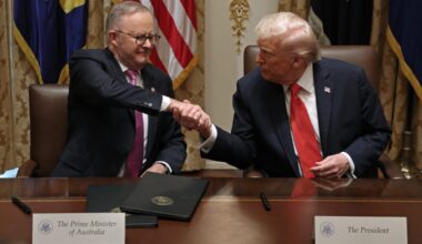President Trump and Prime Minister Albanese shake hands.