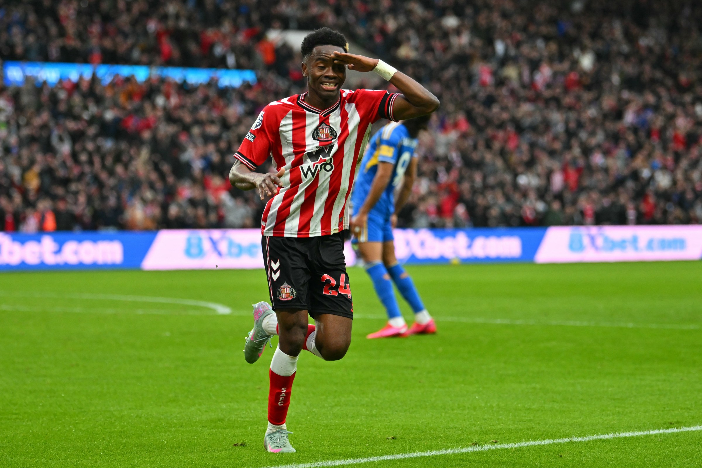 Sunderland’s English Ivorian #24 Simon Adingra celebrates after scoring the opening goal of the English Premier League football match between Sunderland and Leeds United at The Stadium of Light in Sunderland in north east England on December 28, 2025. (Photo by ANDY BUCHANAN / AFP via Getty Images) / RESTRICTED TO EDITORIAL USE. No use with unauthorized audio, video, data, fixture lists, club/league logos or ‘live’ services. Online in-match use limited to 120 images. An additional 40 images may be used in extra time. No video emulation. Social media in-match use limited to 120 images. An additional 40 images may be used in extra time. No use in betting publications, games or single club/league/player publications. /