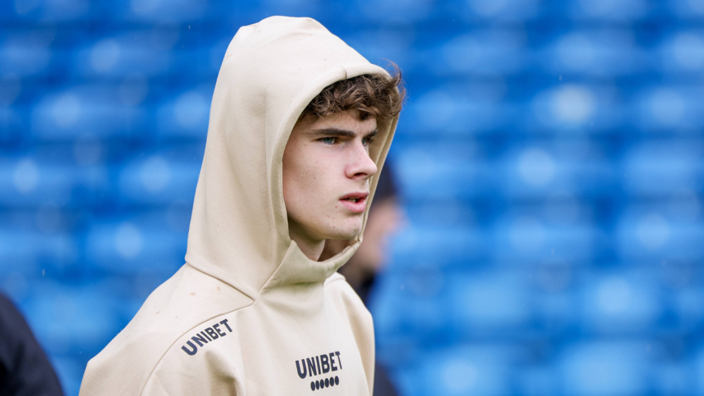 Leeds United starlet Harry Gray wears a hoodie ahead of a game.