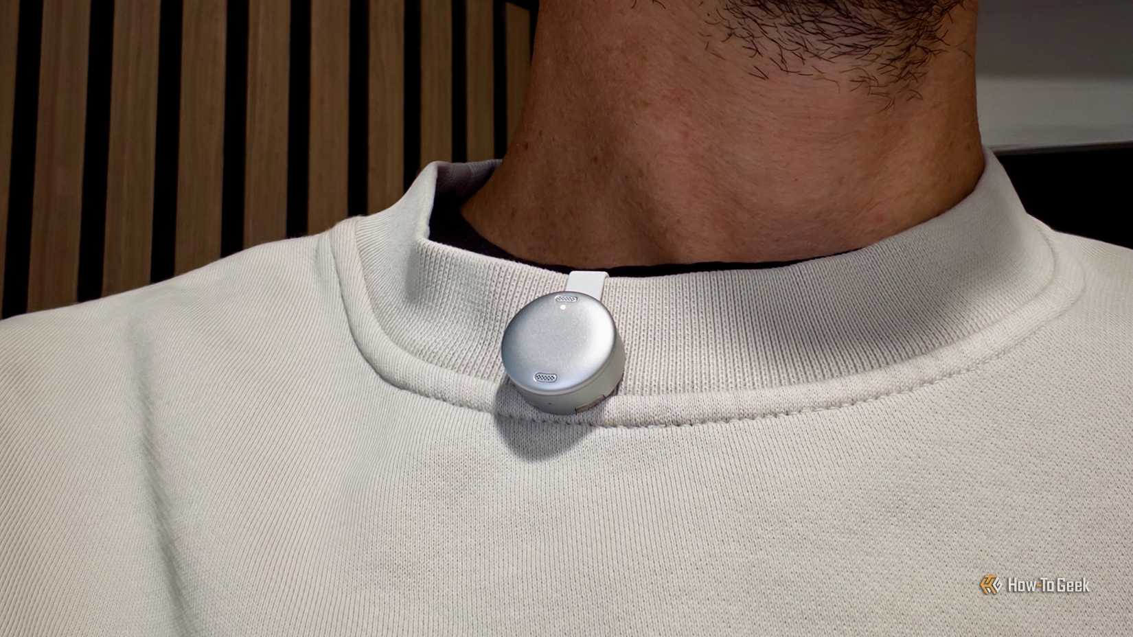 Anker Soundcore Work attached to a sweatshirt.