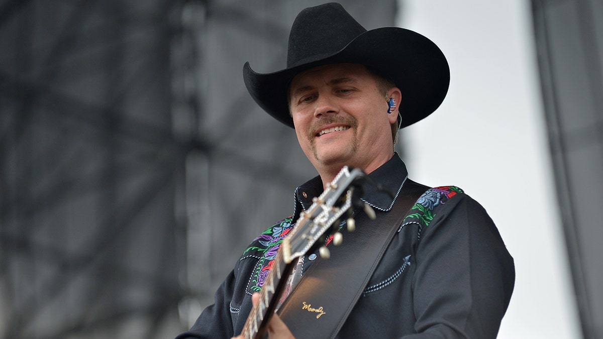 John Rich performing on stage in 2018