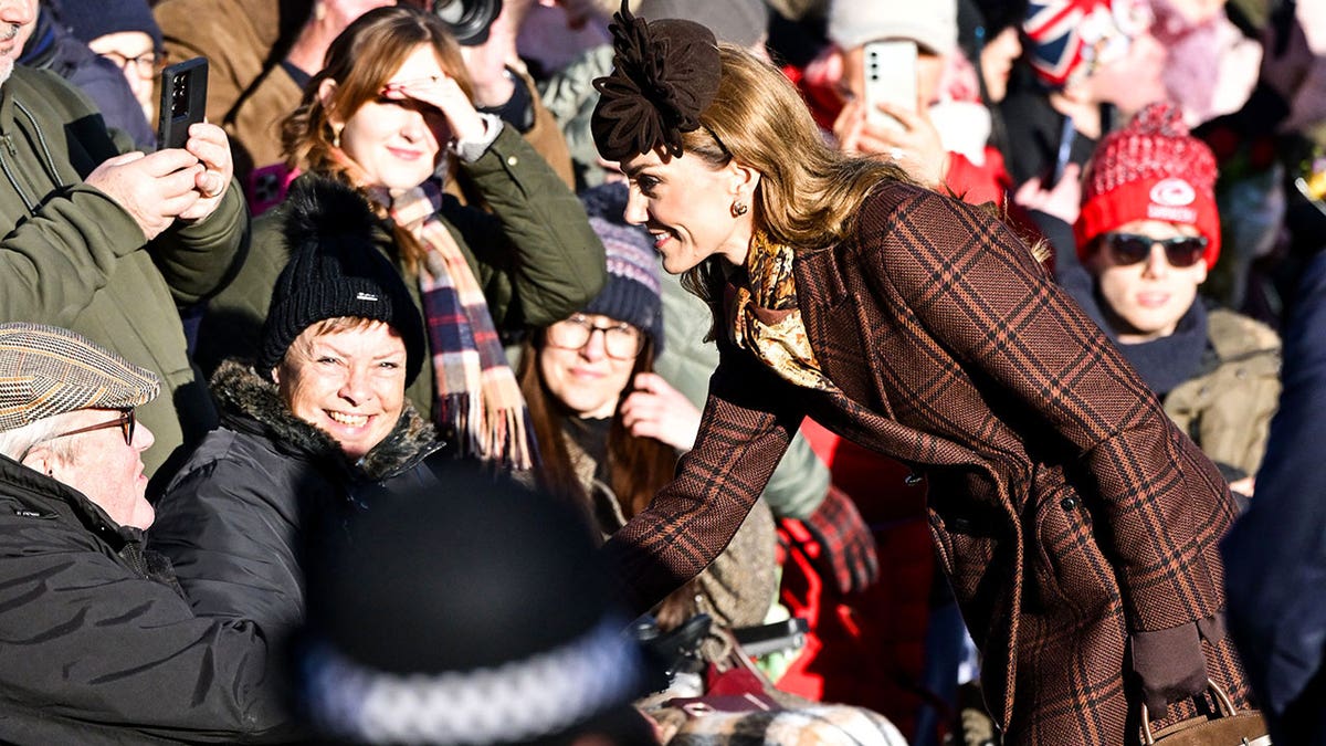 Kate Middleton greeting a cheering crowd on Christmas Day at Sandringham.