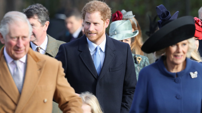 Prince Harry at Sandringham with his father and Camilla