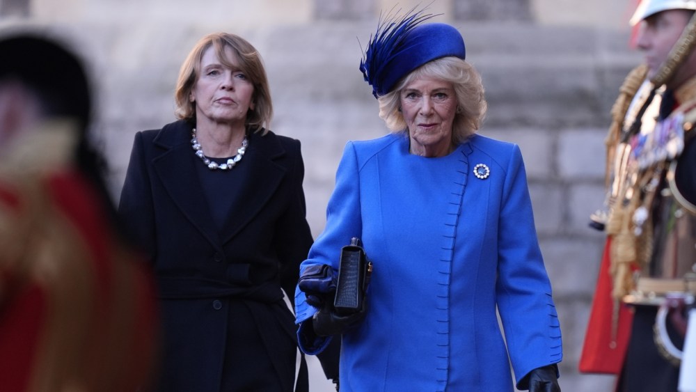 Queen Camilla wears an Anna Valentine coat and the Prince Albert sapphire and diamond brooch at the ceremonial welcome at the start of the State Visit to the United Kingdom of the German President Frank-Walter Steinmeier on Dec. 3, 2025 in Windsor, England.
