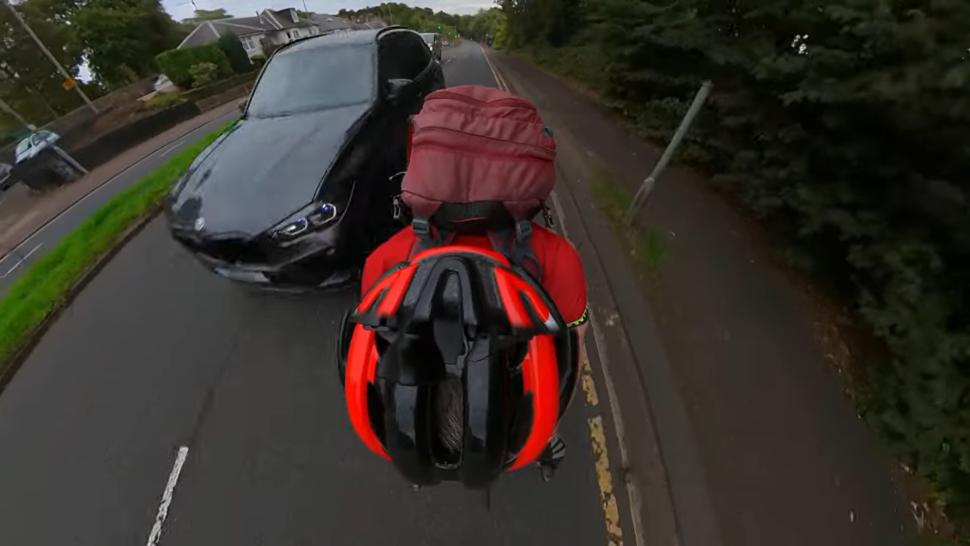 Cyclist films close pass and phone use 