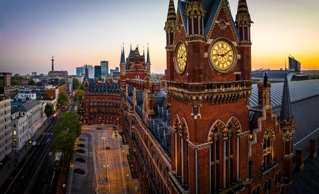 The Victorian exterior of St Pancras International Station at sunset