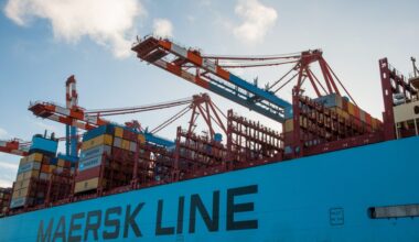An up-close image of a Maersk ship in port