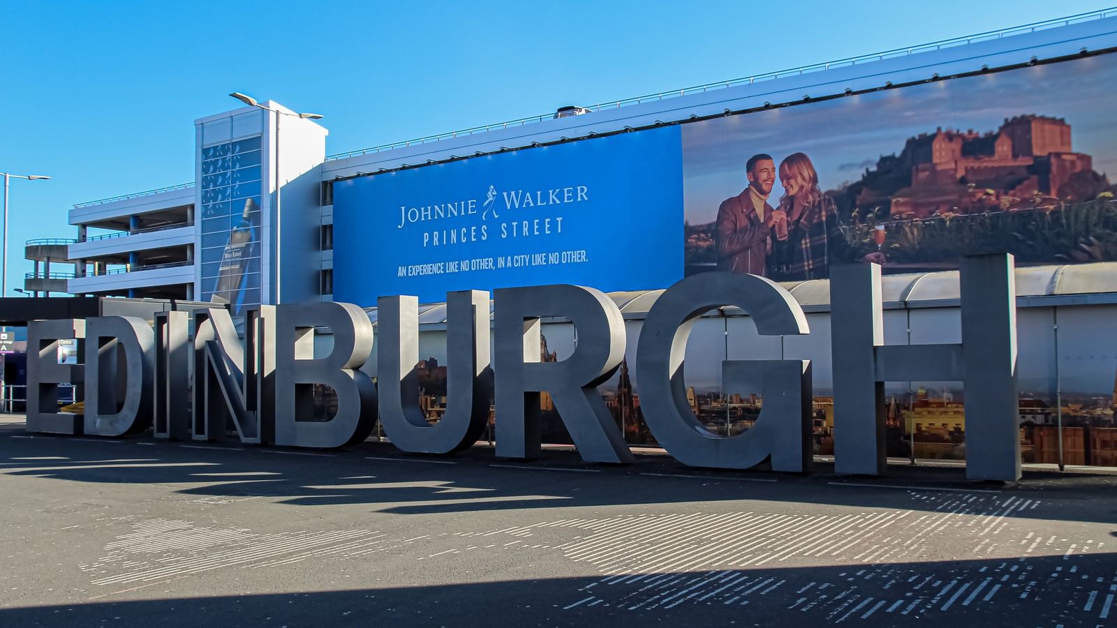 Edinburgh Airport: Flights resume after 'IT issue' halted air traffic - as it happened | UK News