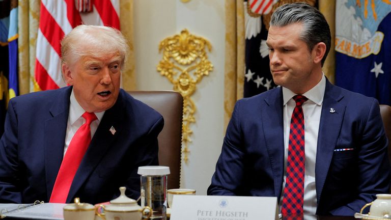Donald Trump and Pete Hegseth during a cabinet meeting at the White House on 2 December. Pic: Reuters