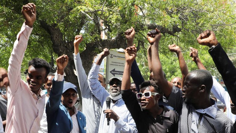Somalis react after Israel became the first country to formally recognise Somaliland. Pics: Reuters