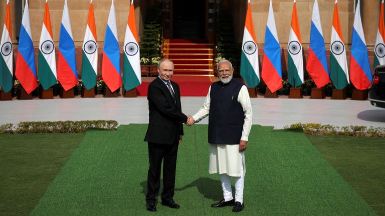 Mr Putin and Mr Modi ahead of their meeting at Hyderabad House in New Delhi. Pic: Reuters