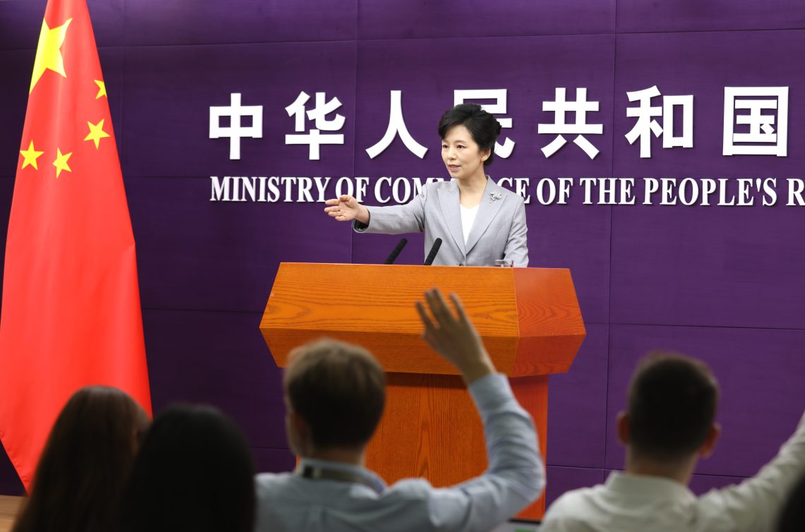 July 3: A spokesperson for China's Ministry of Commerce discusses trade and export policy at press conference in Beijing, China. 