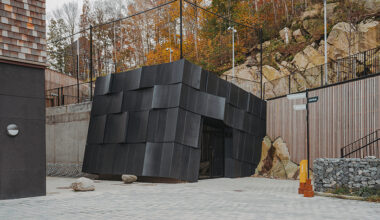 erdegard arkitekter carves 'mountain chamber' threshold to swedish cave